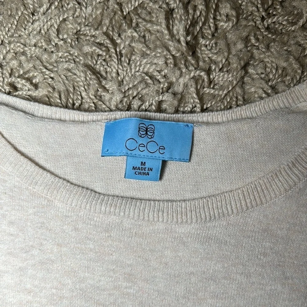 Cece Women's Cream Long Puffy Sleeve with Pearl Buttons Sweater Blouse‎